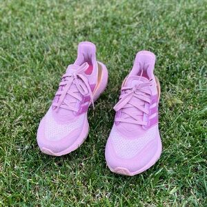 Adidas UltraBoost women’s running shoes - Soft lilac purple with metallic gold.